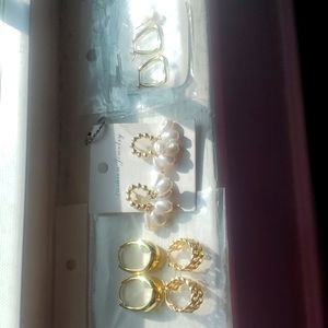 5 pairs of earrings and one ring
